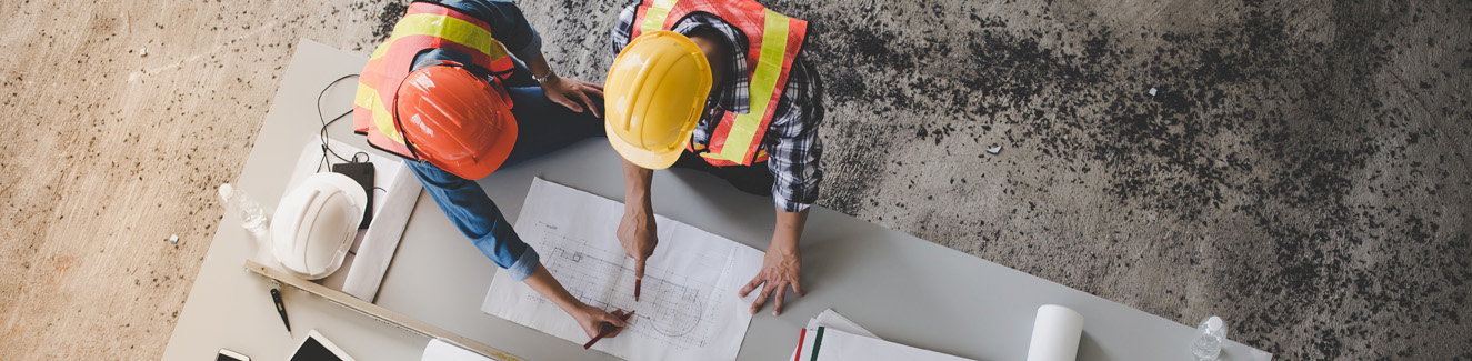 Top view of architects and engineers to help create a blueprint