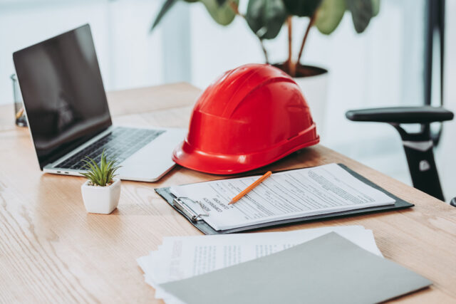 hardhat clipboard laptop